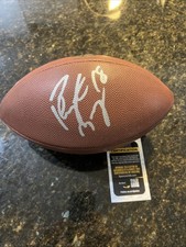 Peyton Manning firmato Wilson