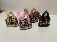 Lotto di 4 portachiavi/o