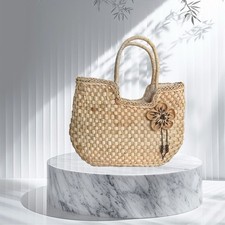 Borsa in paglia con ciondolo