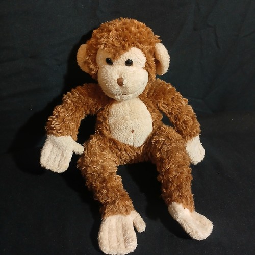 Peluche scimmia coccola