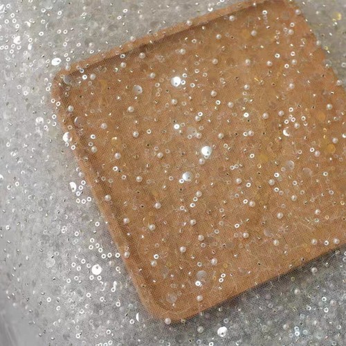 Tessuto rete con paillettes - in,