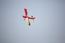 Torcster OMP Challenger 1250 mm rosso PNP legno allenatore brushless modello RC nuovo 