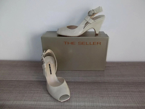 The seller sandalo tacco - seller,