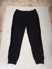 Pantalone tuta blu con banda