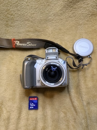 Canon powershot 5 mp - is,