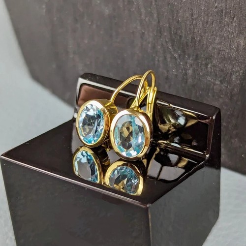 Orecchini pendenti bouton con