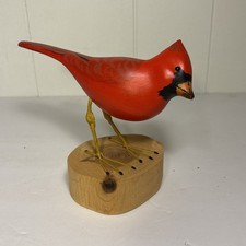 Statua cardinale uccellino su