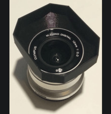 Olympus 12 mm f2.0 paraluce -