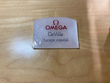 OMEGA - Placa Expositor - DE