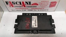 BMW E87 E90 E91 E92 E93 Centralina Modulo Vano Piedi 9166708 Fanale Xenon
