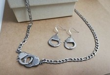 Collana orecchini con manette