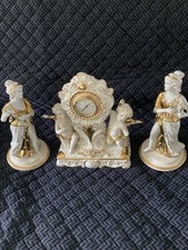 Capodimondi Vittorio Sabadin due statuette e una con orologio Bellissime