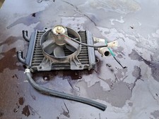 RADIATORE + VENTOLA PEUGEOT ELYSEO 125 1999 - 2002 (DF1516)