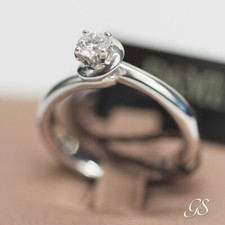 Anello solitario Damiani  oro