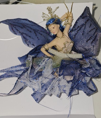 Ornamento statuina bambola