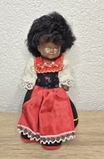 Vecchia bambola di plastica