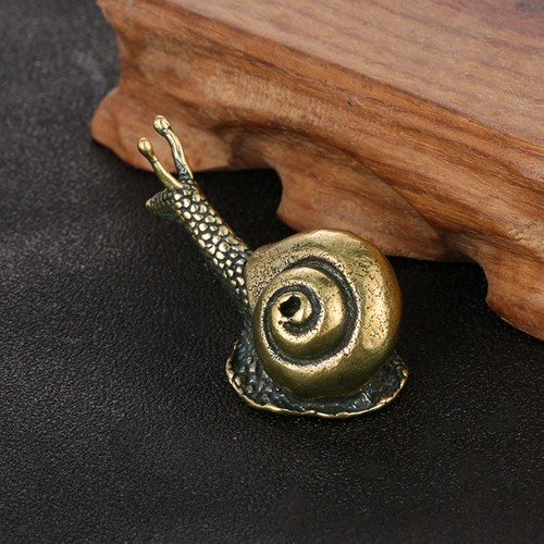 Scultura lumaca in - in, stile