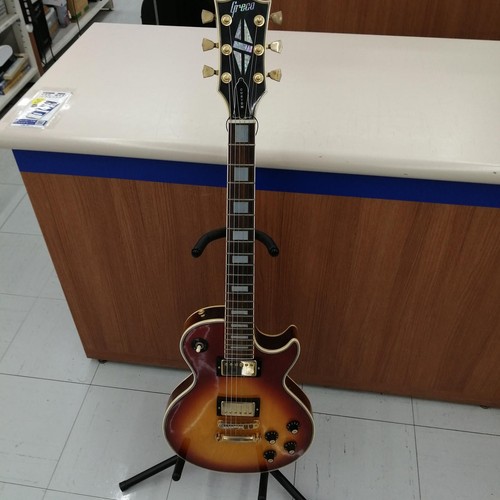 Chitarra elettrica - (greco),