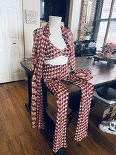 Coprispolverino, pantaloni e