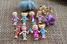 Lotto 8 figurine bambole Polly