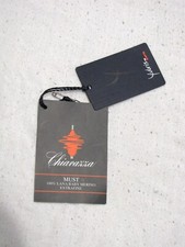 Etichetta originale e spilla Chiavazza baby lana merino extrafine biella Yubris