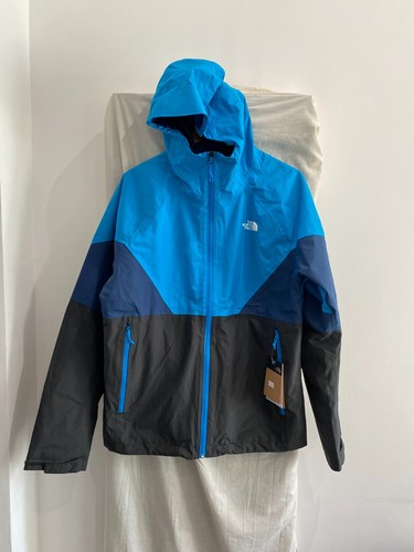 Giacca antipioggia blu con