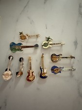 Lotto di 8 "SPILLE CHITARRA