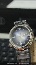 with box and papers Tissot