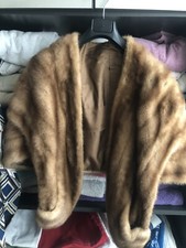 stola in visone con tasche