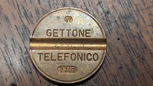 Gettone telefonico 7701 - 7701, ut