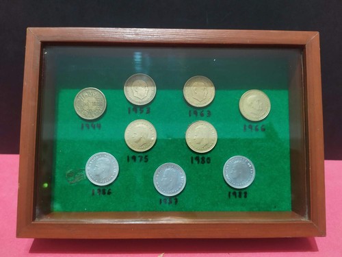 Monete pesetas incorniciate