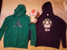 Set di Felpe Atari & Super Mario Bros Più Peluche Toad