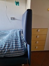 Letto una piazza e mezzo marca Twils con rete a dogh , testata imbottita bluette