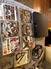 Sony PlayStation 3 + Games