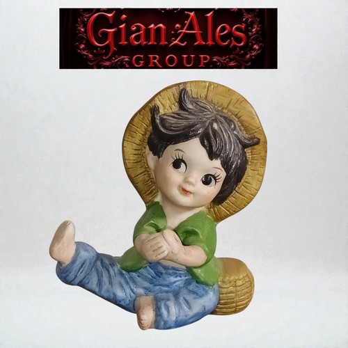 Statuina bambino che - un,