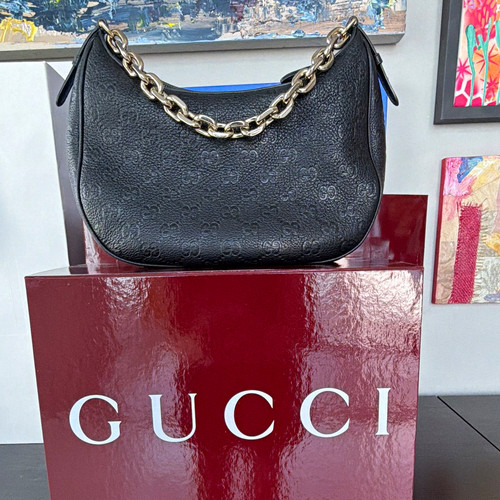 Gucci black embossed - gucci,