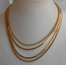 Collana targhetta MONET 4 fili metallo dorato