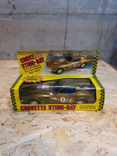 Corvette sting ray gold with - corvette,