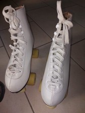 Vendo pattini a rotelle quad usati pochissimo con accessori e protezioni annesse