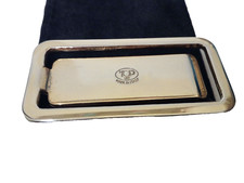 da collezione fermasoldi in metallo dorato è argentato è bustina in panno nuovo