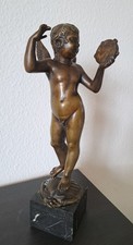 Antica scultura putto in