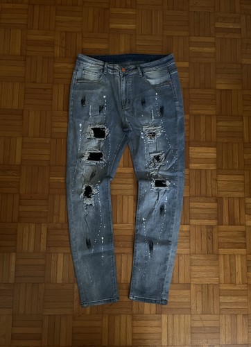 Jeans slim fit strappati