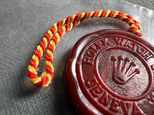 Rolex vintage red tag seal