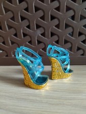 "Monster High" scarpe per Bambola "Frankie Stein", colore azzurro e oro.