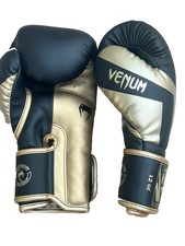 Guantoni da boxe da allenamento Venum Elite Skintex con gancio e anello - Nero/Oro