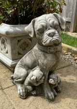 Statua in pietra cane e