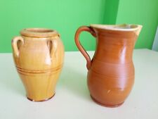 ANTICHE  BROCCHE IN TERRACOTTA SMALTATA.