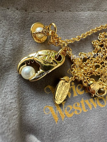 Collana con ciondolo forma - con, a