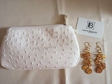 Orecchini dorati pendenti con