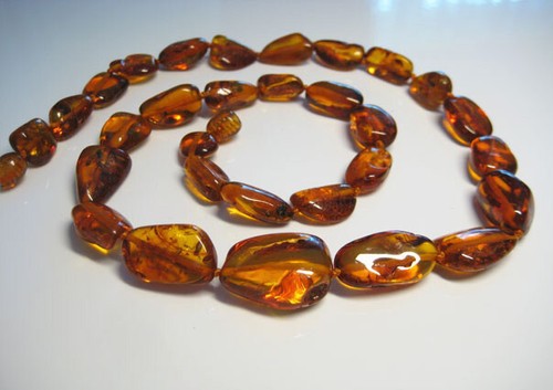 Collana perle ambra - di,